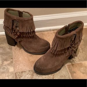 Brown moccasin high heeled boots